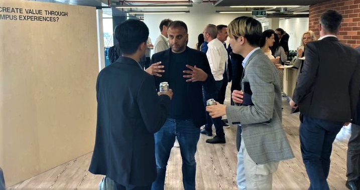 GEP Masterclass event at London Tech Week Sept 2021, hosted by WONGDOODY. Delegates networking (3 men in discussion)
